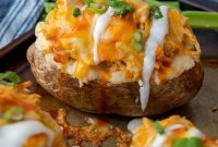 Buffalo Chicken Stuffed Baked Potatoes with Melted Cheese