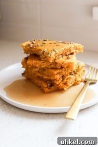 Baked Pumpkin Sheet Pan Pancakes — Fluffy Fall Brunch Recipe 6 a stack of healthy pumpkin pancakes