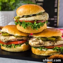 Crispy Chicken Sandwich Recipe with Tangy Slaw and Pickles 9 Close up photo of a stack of Chicken Sandwiches