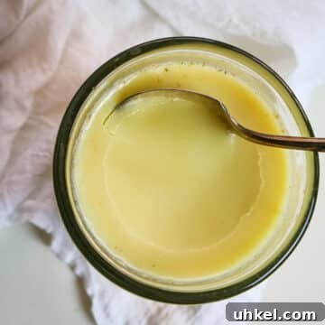 beef tallow with spoon scooping