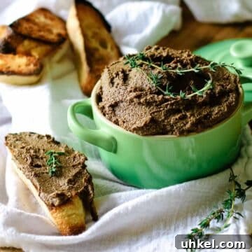 beef liver pate in green ramekin