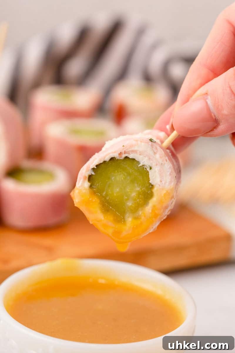97 Crowd-Pleasing Appetizer Ideas for Parties and Gatherings 2 Fun pickle roll up appetizer on stick.