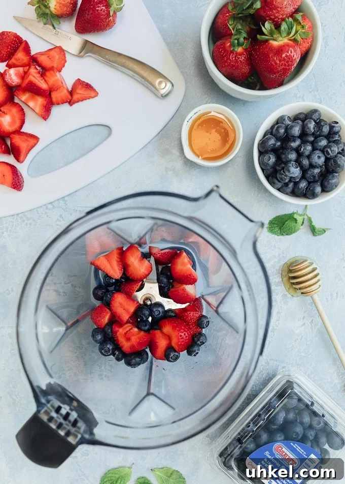 Mixed berry vinaigrette strawberries and blueberries in a blender for mixed berry vinaigrette