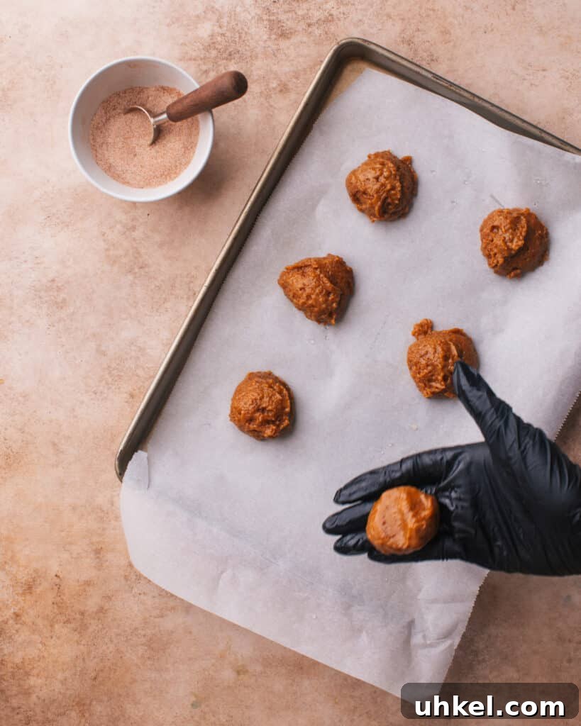 Shape the cookies using dampened hands.