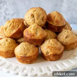 Moist Banana Walnut Muffins with Cinnamon Streusel 14 A platter filled with banana walnut muffins.