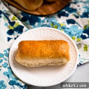 Ground Lamb Stuffed Buns Recipe – Savory Meat-Filled Bread 11 Top down photo of a meat stuffed bread roll.