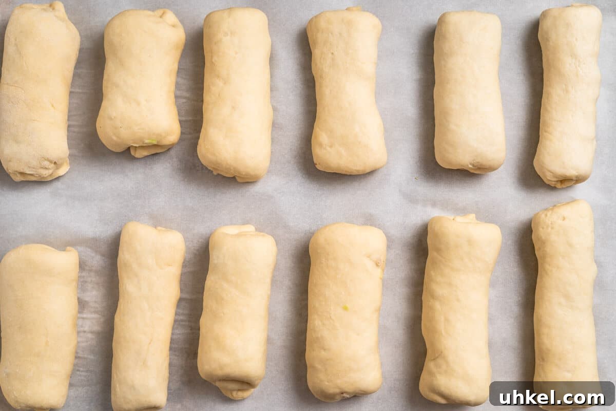 Ground Lamb Stuffed Buns Recipe – Savory Meat-Filled Bread 7 Tray filled with assembled meat filled buns.