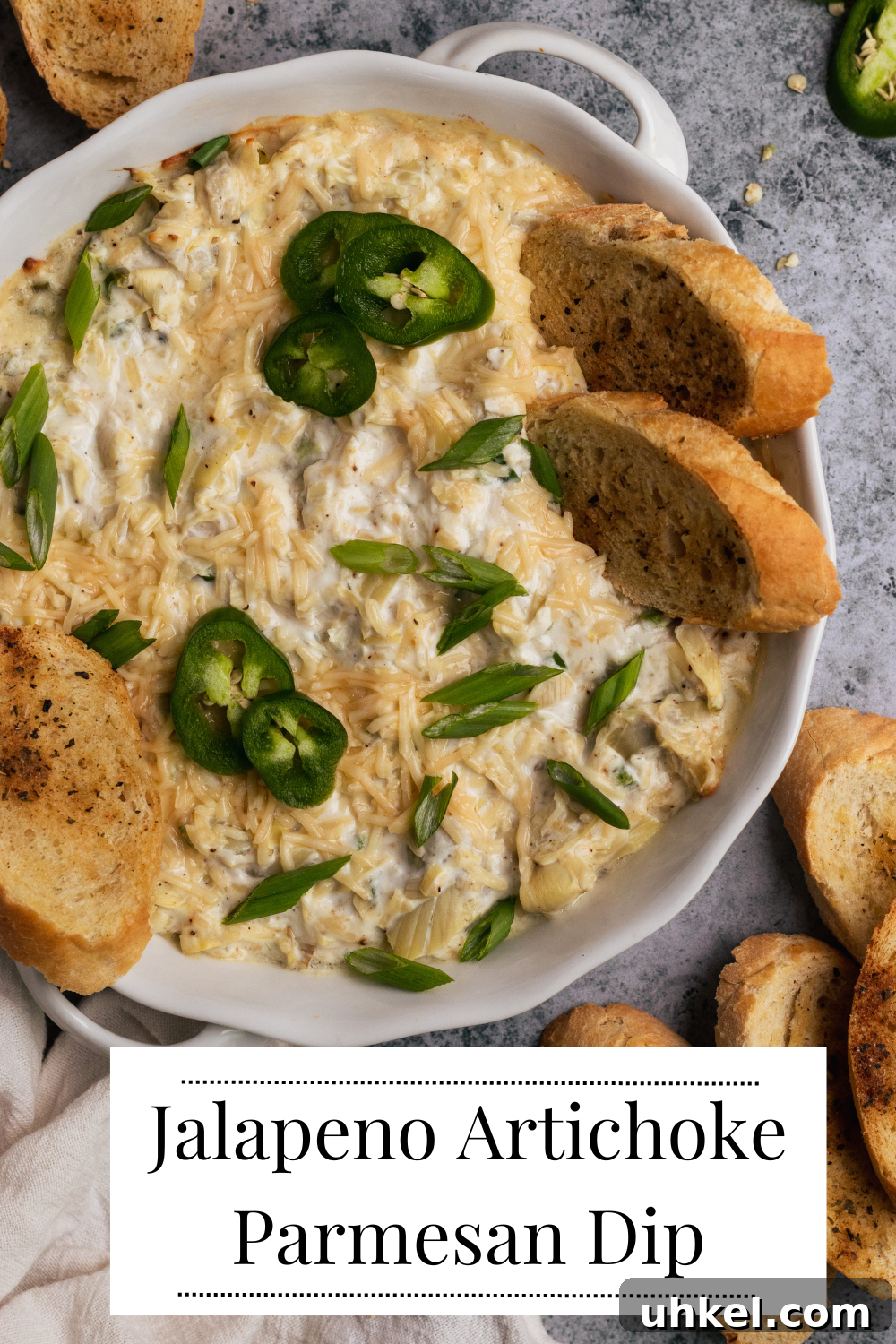 Spicy Jalapeño Artichoke Parmesan Dip Recipe 5 This jalapeno artichoke parmesan dip is the perfect appetizer! Every time I make it, it's immediately gobbled up. Creamy, delicious, and a little spicy! The perfect game day appetizer. #appetizer #easyappetizer #jalapenoartichokedip