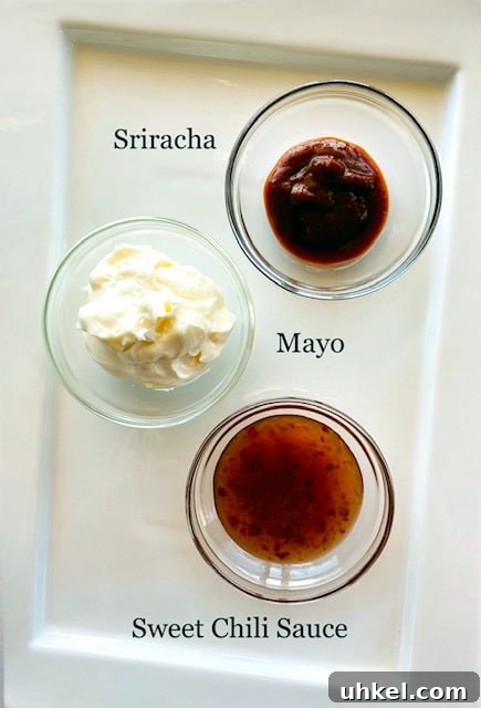 Bang Bang Sauce Recipe: Creamy Spicy Asian-Style Dipping Sauce 3 Bang-Bang-Sauce-ingredients-in-bowls-mayonnaise-sriracha-sweet-chili-sauce