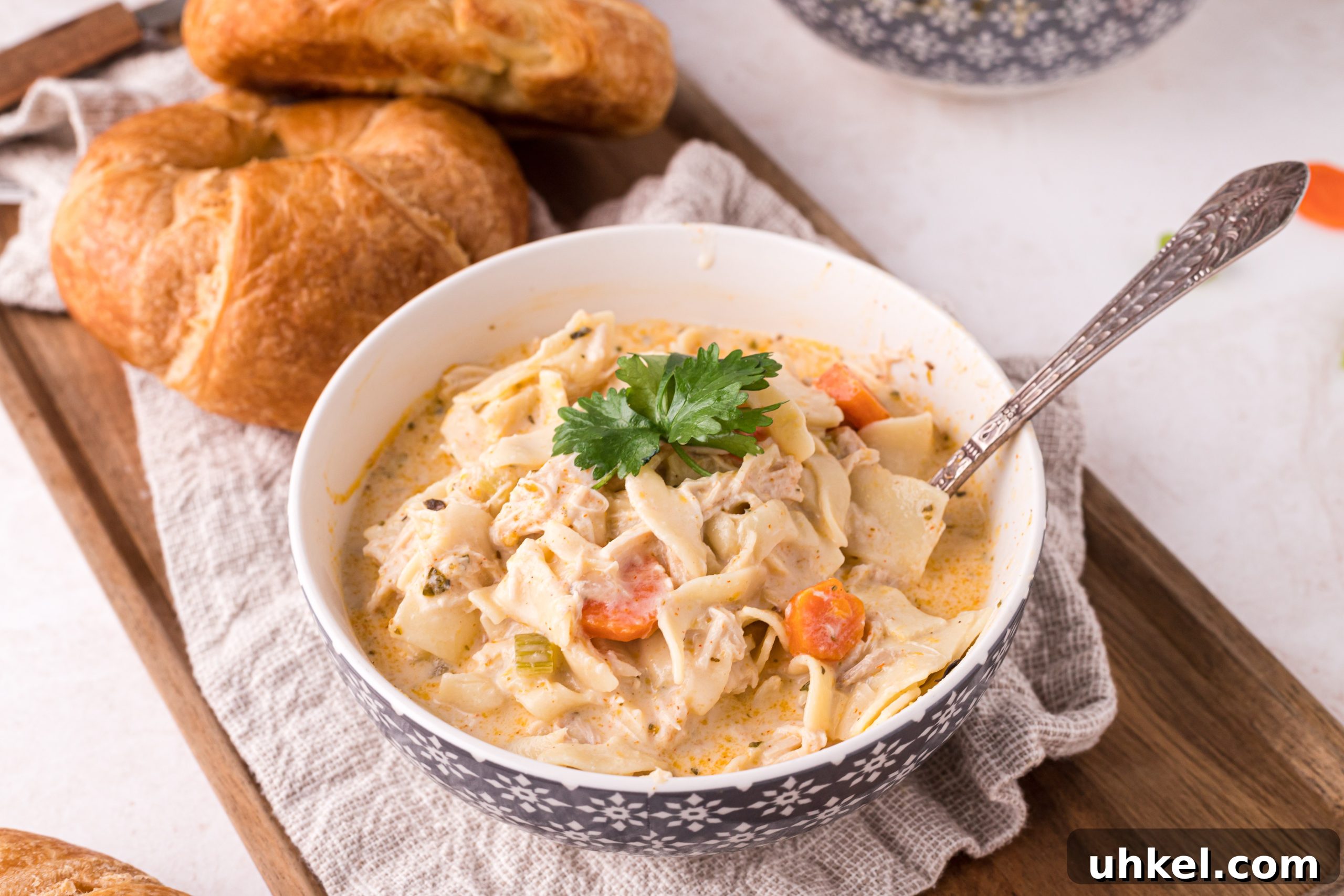 Creamy Homemade Chicken Noodle Soup Recipe for Comforting Meals 12 Sautéing vegetables