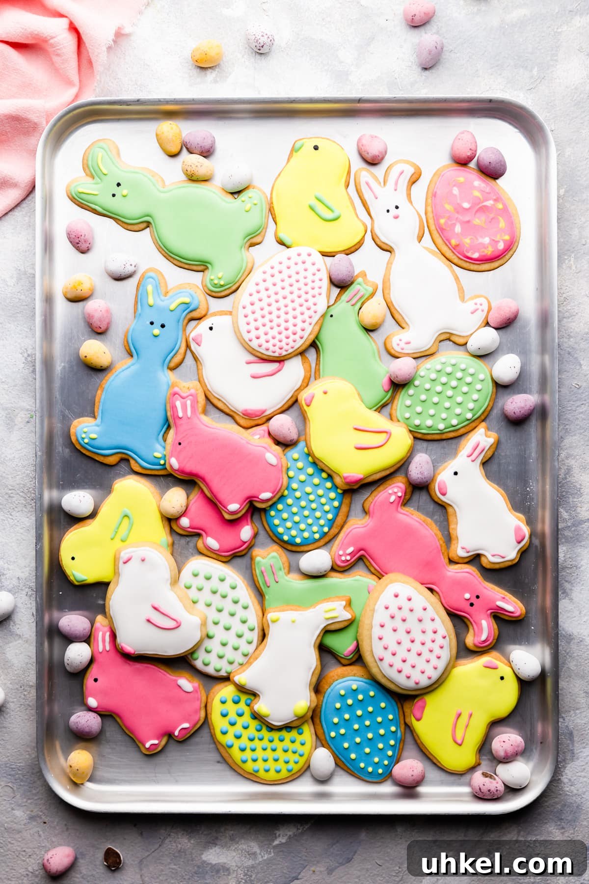Easter Sugar Cookie Recipe with Simple Decorating Ideas 11 top view at Easter sugar cookies with icing on a baking sheet
