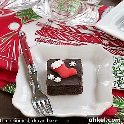 Fudgy Red Wine Brownies - an easy, elegant brownie recipe enhanced by red wine Plated Fudgy red wine brownies with holiday garnishes