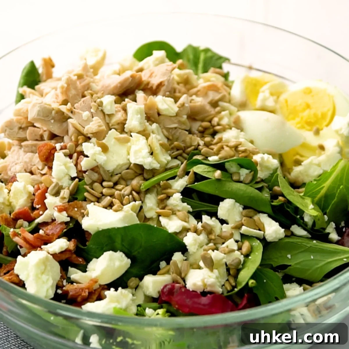 undressed green goddess salad in salad bowl