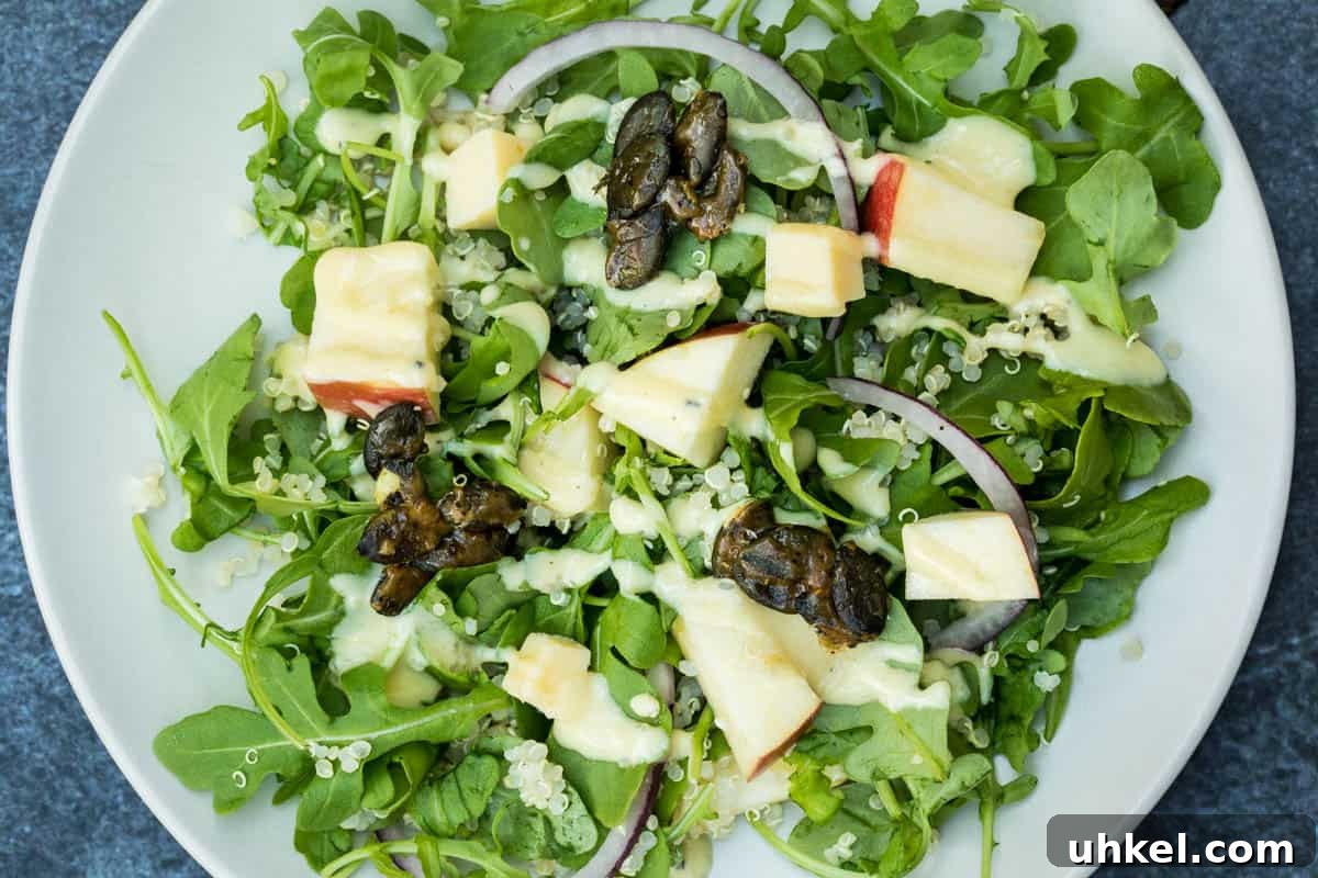 19 Fall Harvest Salads to Brighten Your Table This Season 4 arugula salad with apples and quinoa