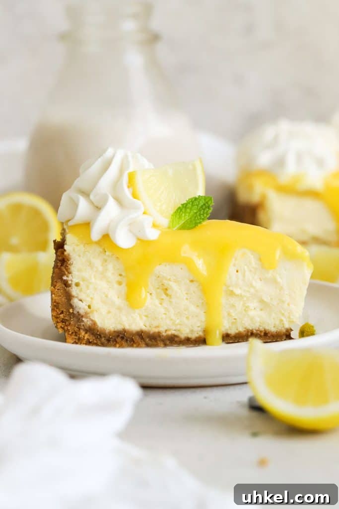 Gluten-Free Blueberry Cheesecake Recipe with Creamy Filling 9 a slice of gluten-free lemon cheesecake with homemade lemon curd
