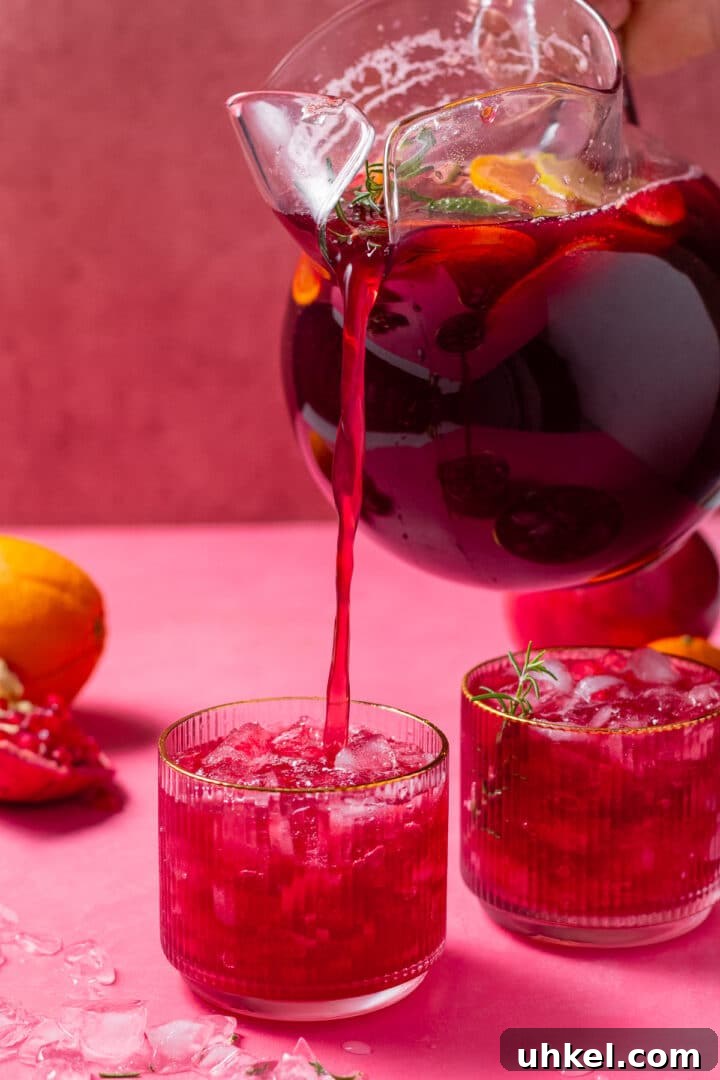 pouring juice into glasses with ice