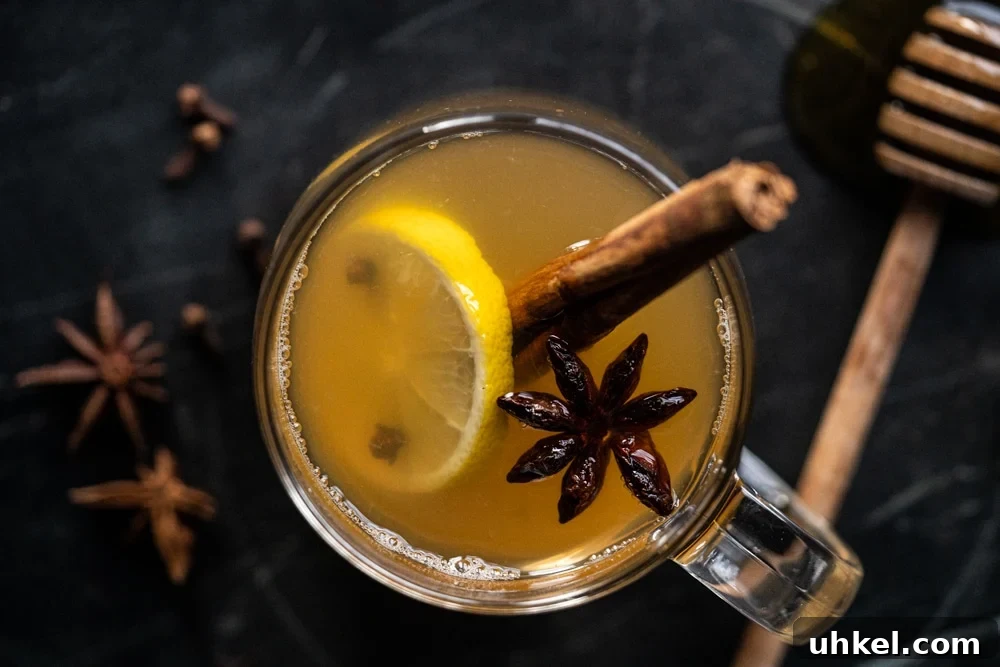 Overhead shot of a keto hot toddy over a black marble surface