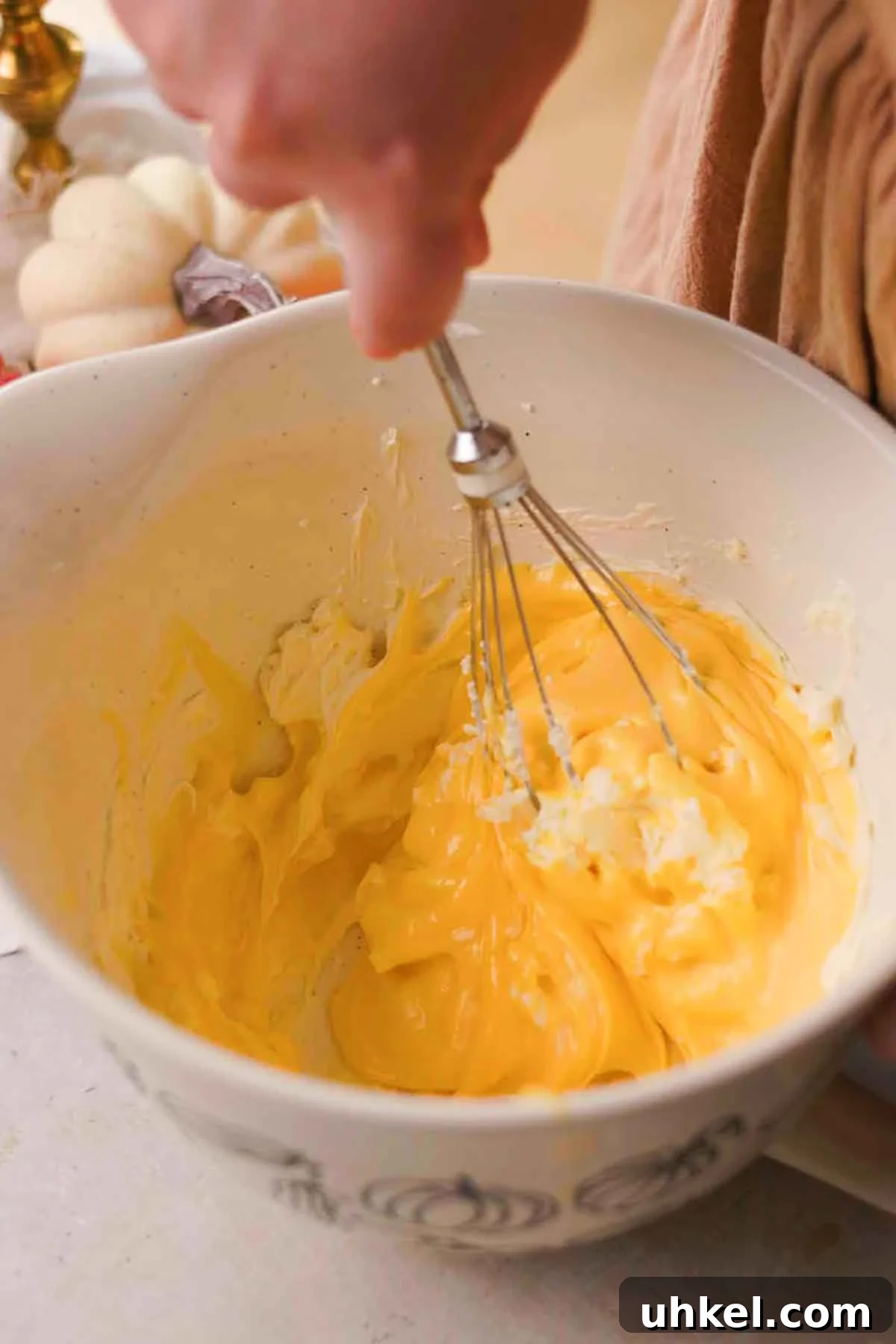 Pumpkin Tiramisu Recipe: Creamy Autumn Dessert with Mascarpone 7 mixing mascarpone and egg mixture
