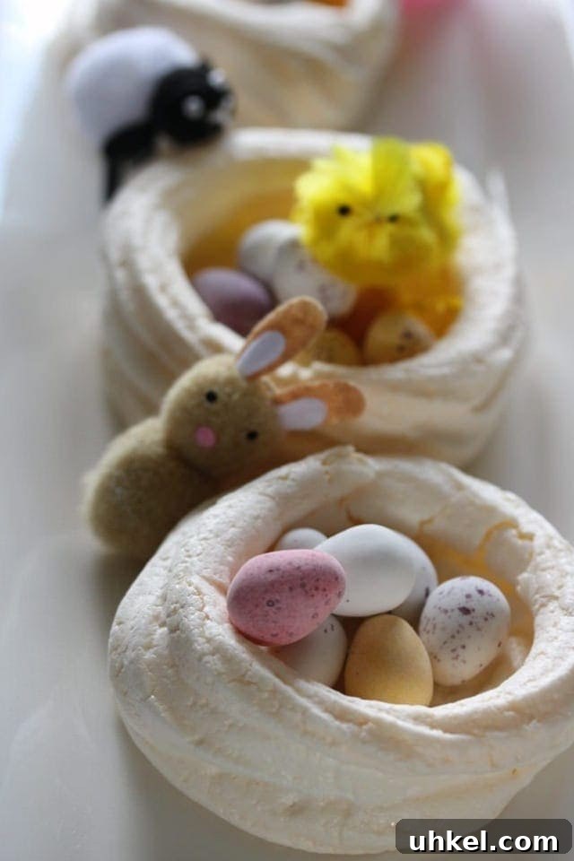 Easter Meringue Nests Recipe with Chocolate Eggs 4 Meringue nest with mini eggs and baby animals