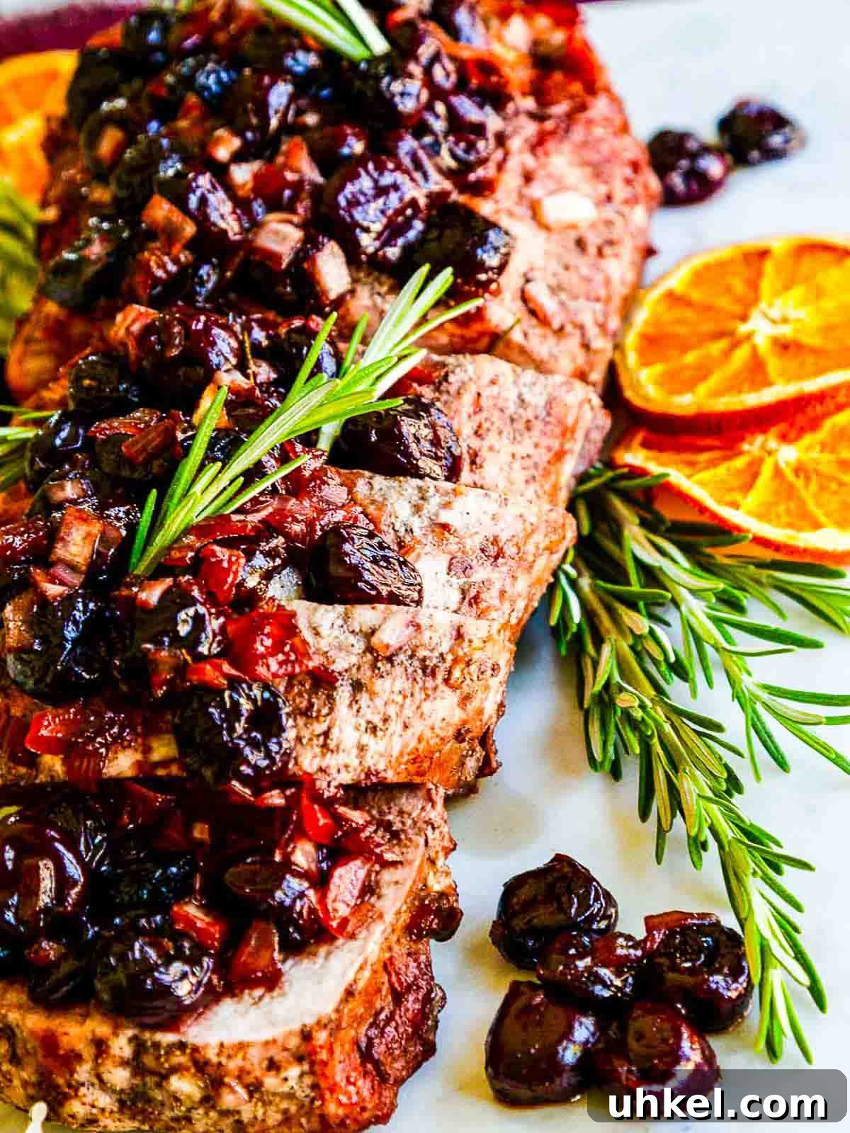 Roasted Cherry Balsamic Pork Loin on marble board