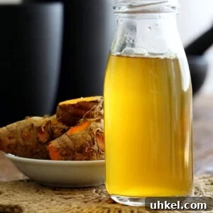 Ginger and Turmeric Root Tea Benefits, Recipe & Brewing Tips 5 Ginger Turmeric Root Tea. Fresh Turmeric Root and ginger simmered with black pepper. Add sweetener of choice. Serve hot or chilled. Vegan Gluten-free Recipe | VeganRicha.com #glutenfree #veganricha #vegan
