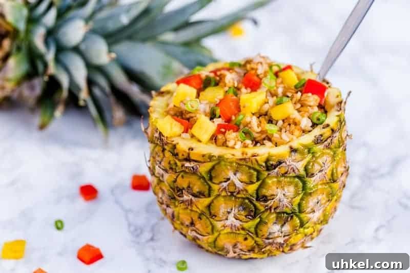 Authentic Thai Pineapple Fried Rice with Cashews 2 A pineapple stuffed with fried rice