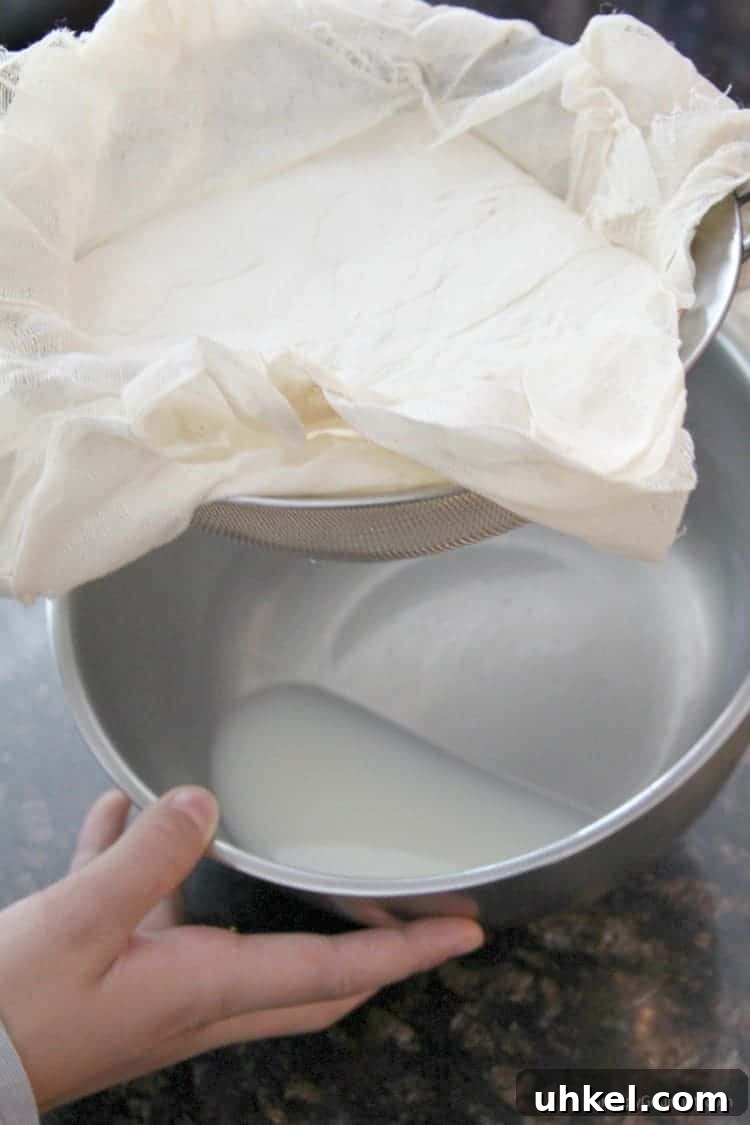 How to strain ricotta cheese liquid in bowl after draining ricotta cheese