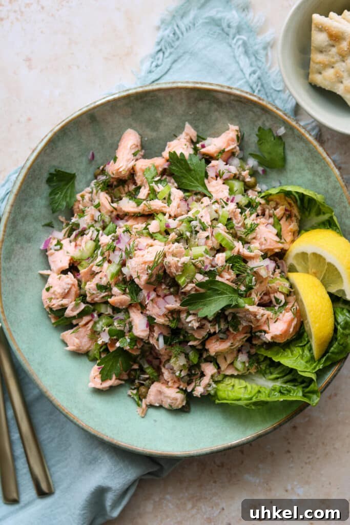 Chilled Poached Salmon Salad with Creamy Dill Dressing 2 easy chilled poached salmon salad in green plate with crackers