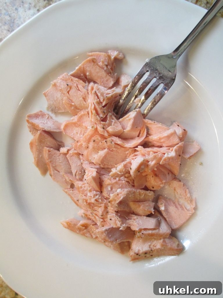 Chilled Poached Salmon Salad with Creamy Dill Dressing 5 flaking poached salmon