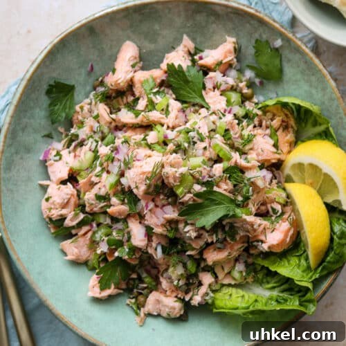 Chilled Poached Salmon Salad with Creamy Dill Dressing 8 easy chilled poached salmon salad in green plate with crackers