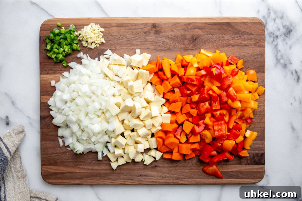 Hearty Vegan Quinoa Chili Recipe: Protein-Packed & Flavorful 5 All of the chopped vegetables for the quinoa chili on a cutting board.