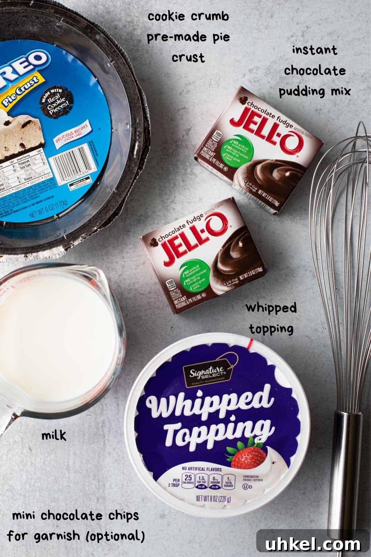 No-Bake Chocolate Pudding Pie with Cool Whip and Jell-O 3 overhead view of recipe ingredients-whipped topping, pudding mix, milk, crust