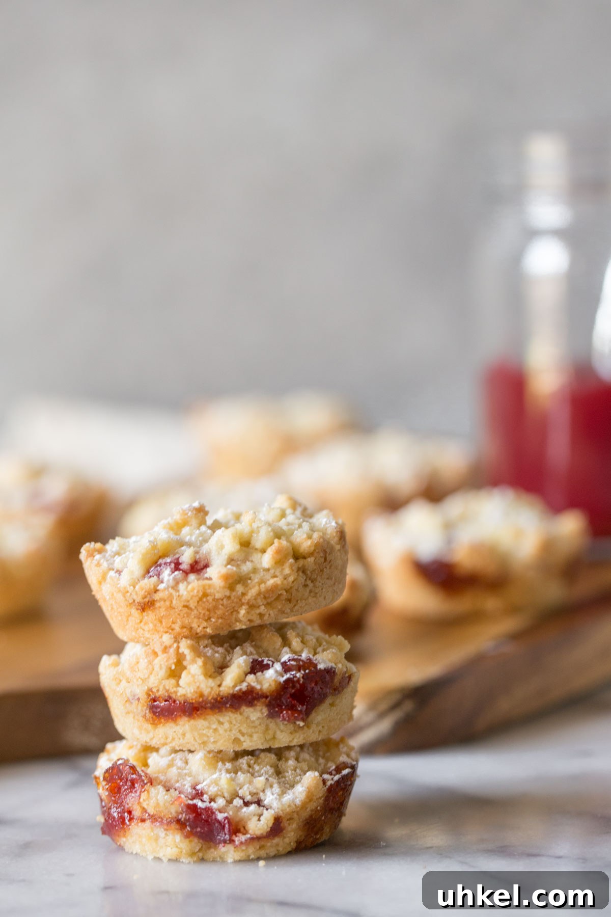 Costco Raspberry Crumble Cookies Review & Where to Buy 7 Costco Raspberry Crumble Cookies stacked three high.
