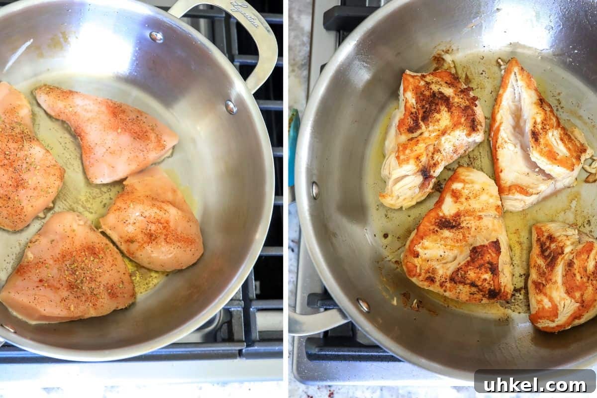 Creamy Garlic Parmesan Chicken Orzo Recipe 4 Chicken raw in a skillet with oil.