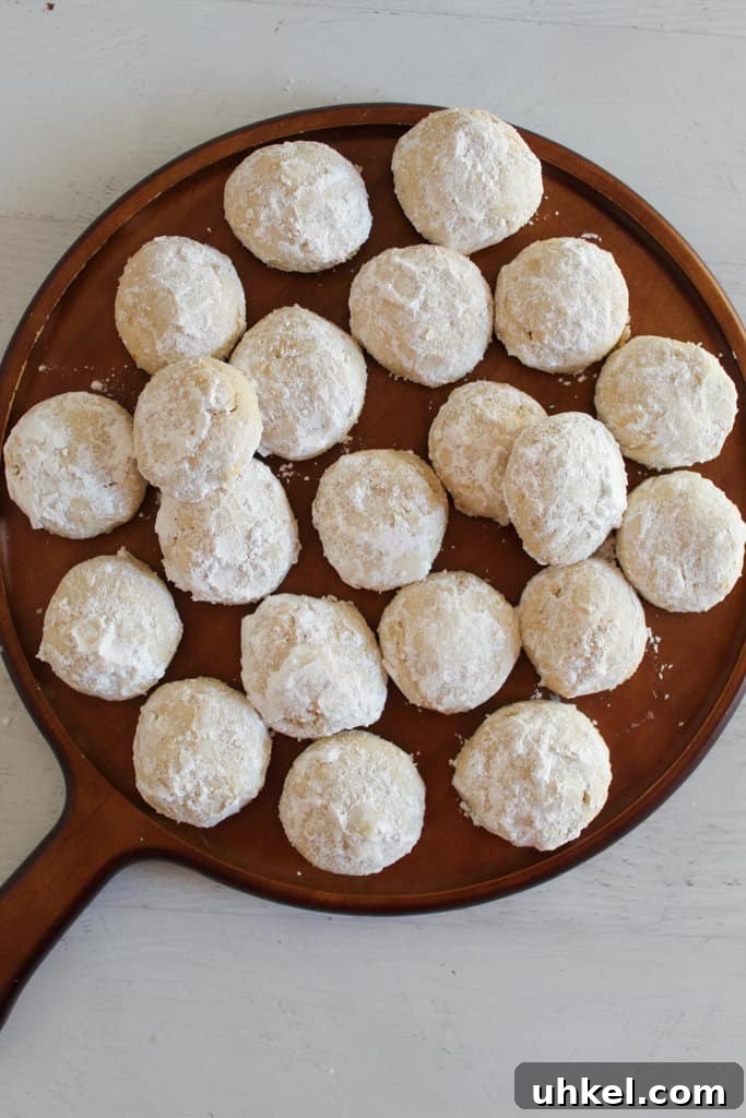 Gluten-Free Mexican Wedding Cookies — Simple, Delicious Recipe 2 serving dish of mexican wedding cookies.
