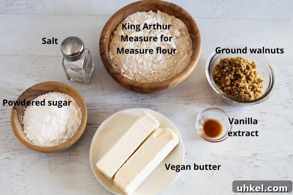 Gluten-Free Mexican Wedding Cookies — Simple, Delicious Recipe 3 labeled ingredients for gluten-free mexican wedding cookies on a countertop