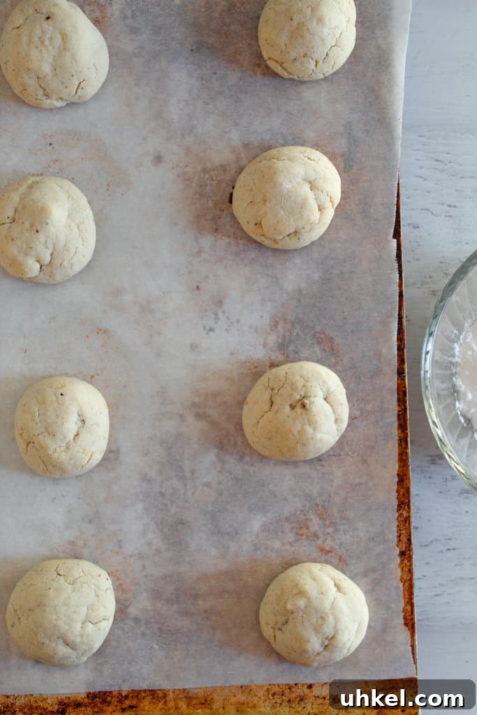 Gluten-Free Mexican Wedding Cookies — Simple, Delicious Recipe 6 pan of cookies on a baking sheet.