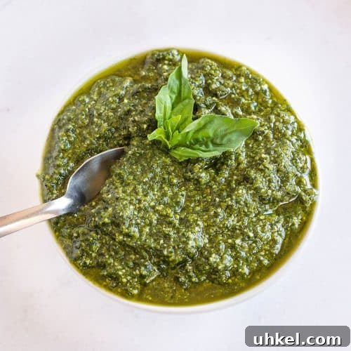 Classic Basil Pesto Recipe: Fresh, Vibrant Sauce for Pasta & More 13 top view of pesto sauce in a white bowl