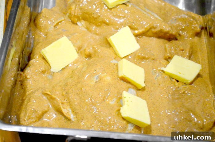 Tandoori Yogurt-Marinated Baked Chicken with Masala 13 add butter to dish