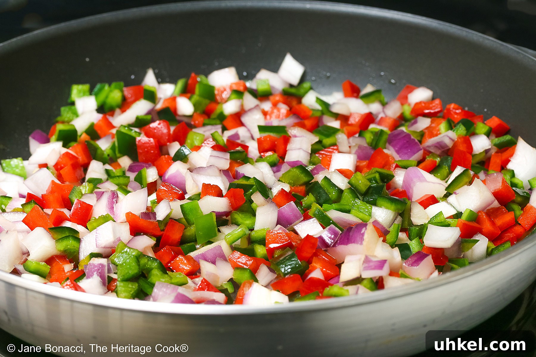 Sautéing vegetables in a skillet.
