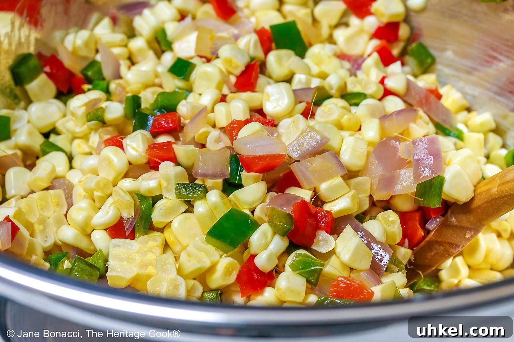 Sautéed vegetables and corn tossed together.