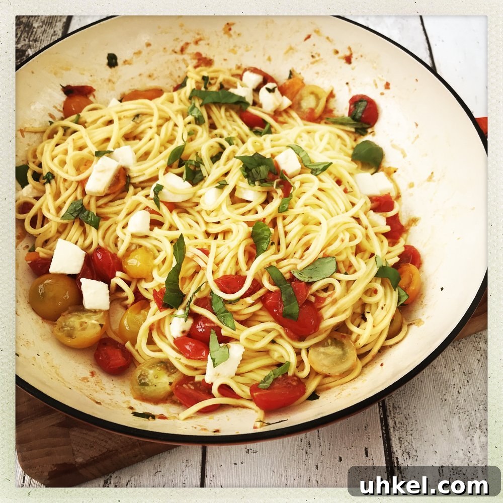 30-Minute Family Dinner Recipes Your Whole Family Will Love 12 enamel pan filled with spaghetti margherita.