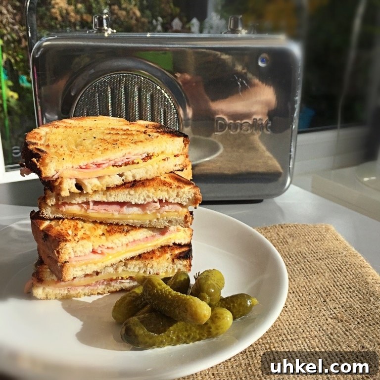 30-Minute Family Dinner Recipes Your Whole Family Will Love 22 dutch style ham and cheese toasted sandwiches with cornichons in front of a Dualit silver radio