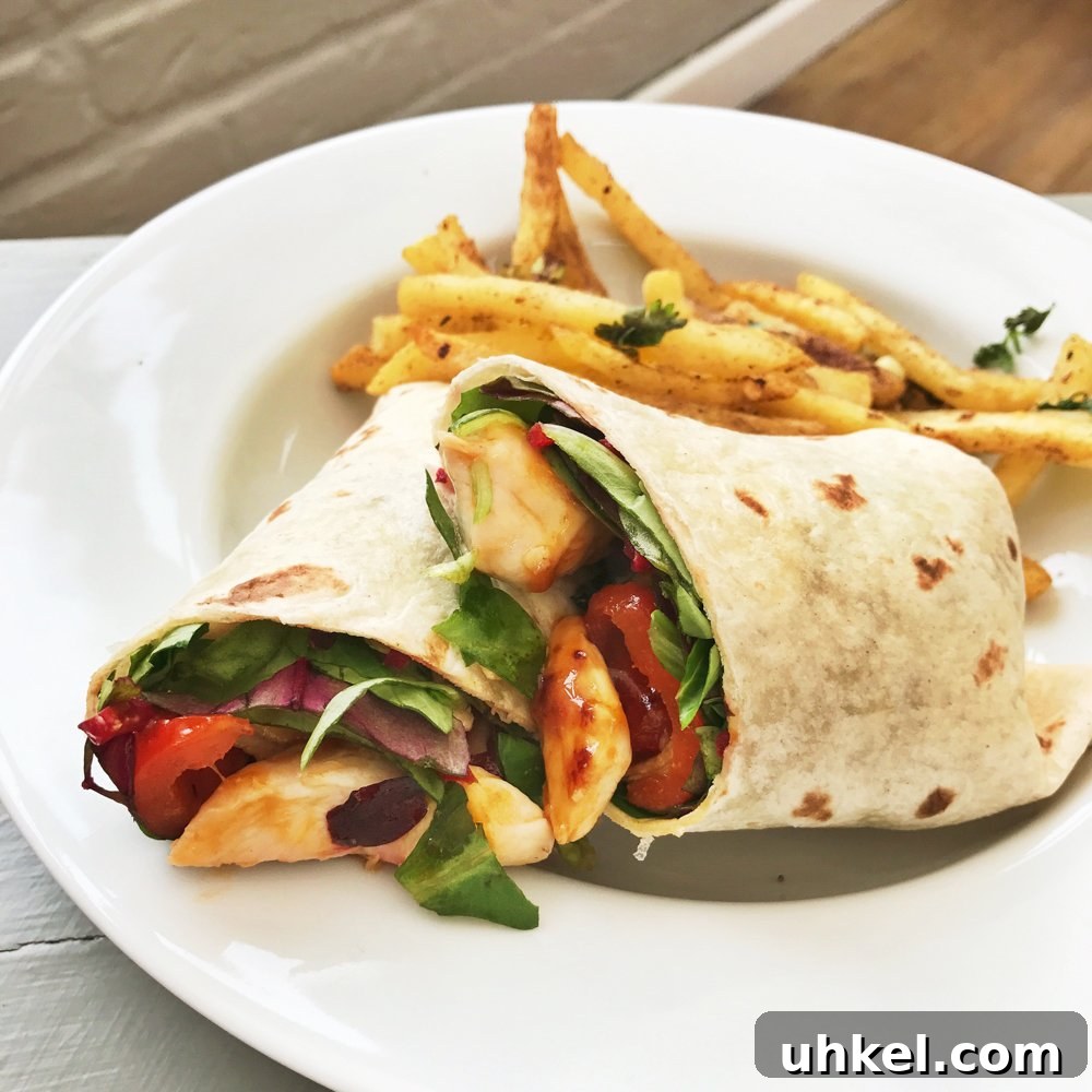 30-Minute Family Dinner Recipes Your Whole Family Will Love 5 sweet chilli chicken and salad wrap with salt and pepper chips