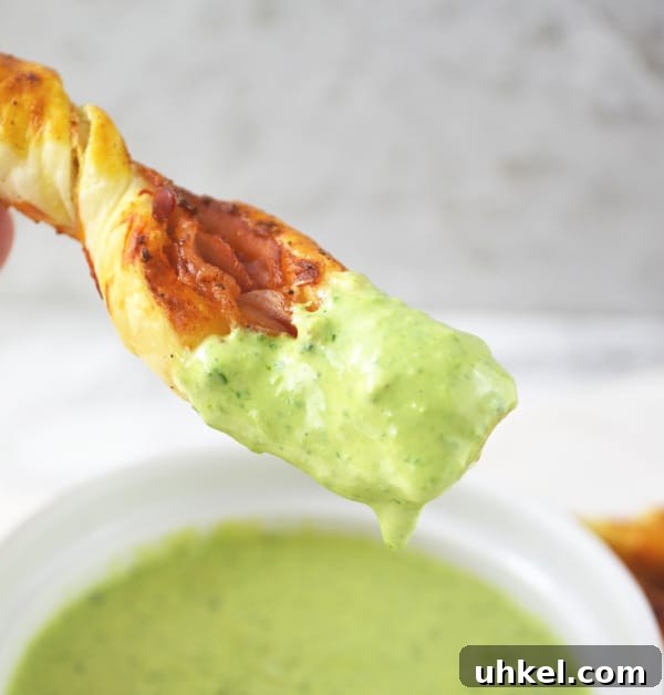 Sour Cream Pesto Dip with Prosciutto Dippers Sour cream pesto dip with prosciutto dippers close up