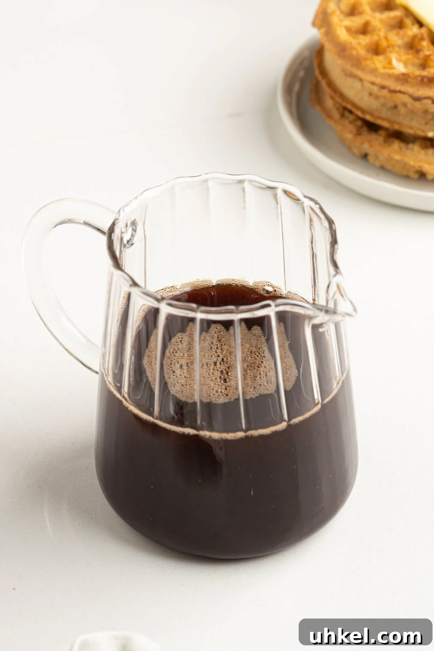 date syrup in a glass