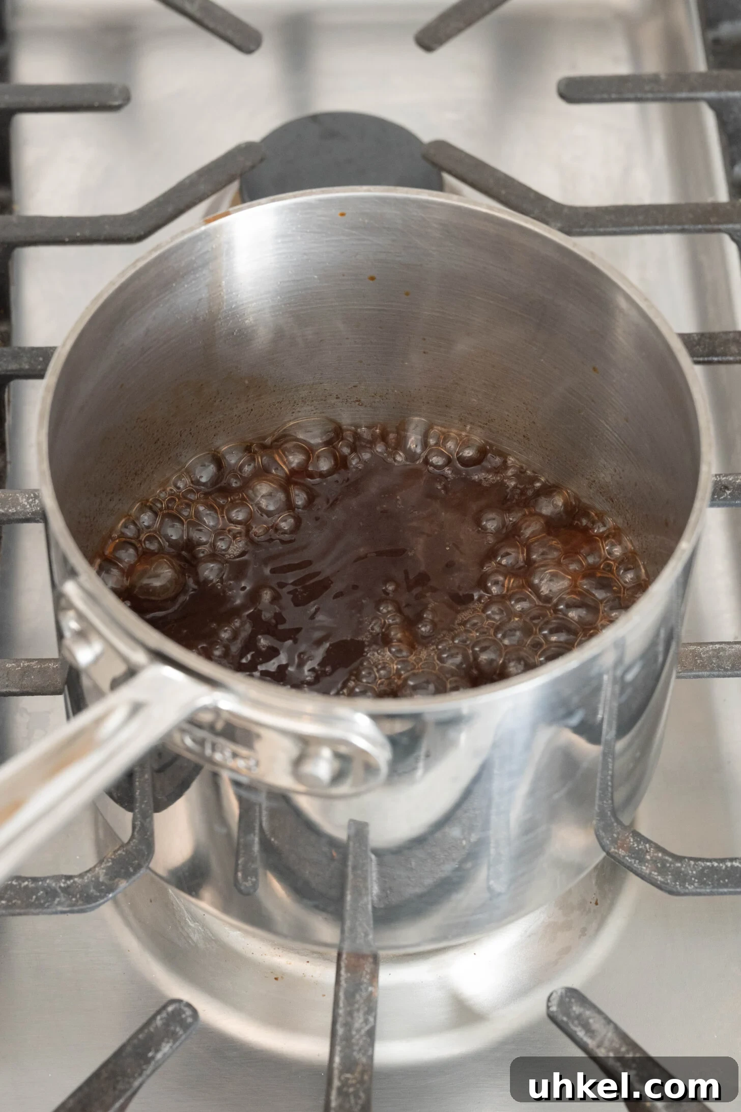 date syrup simmering in a pot