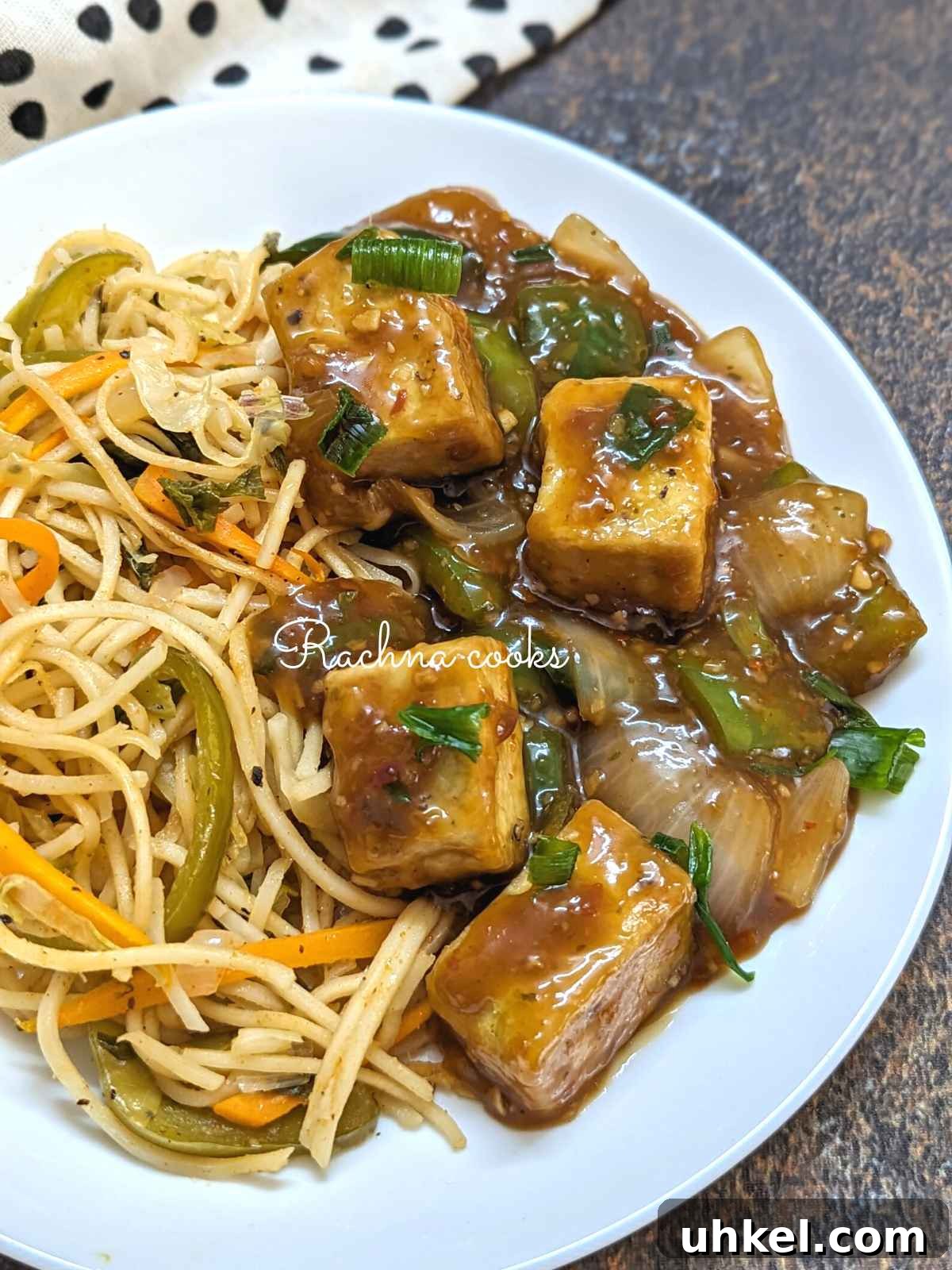 Crispy Tofu Manchurian with Spicy Indo-Chinese Sauce 12 Tofu manchurian served with noodles.