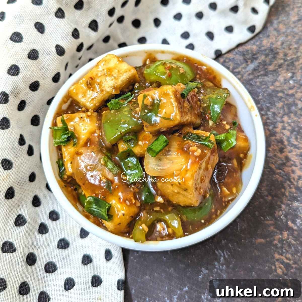 Crispy Tofu Manchurian with Spicy Indo-Chinese Sauce 3 Tofu manchurian served in a bowl.