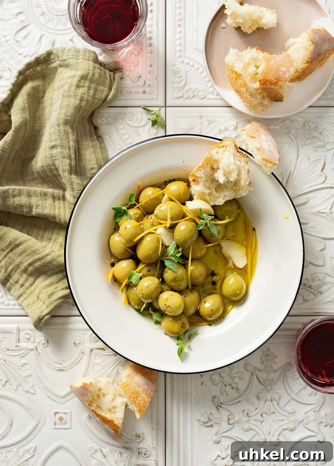 Warm Citrus-Marinated Olives for Parties and Cocktails 3 Warm Citrus Olives // FoodNouveau.com